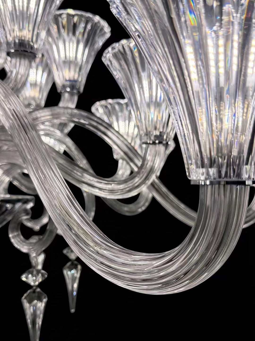 Fan shaped crystal wall sconce